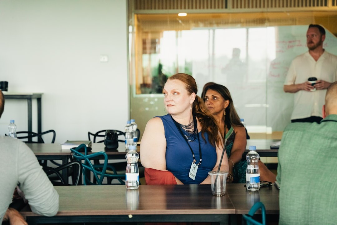 Diverse group of professionals talking at a business conference