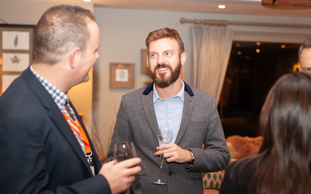 Networking cocktail reception with professionals mingling